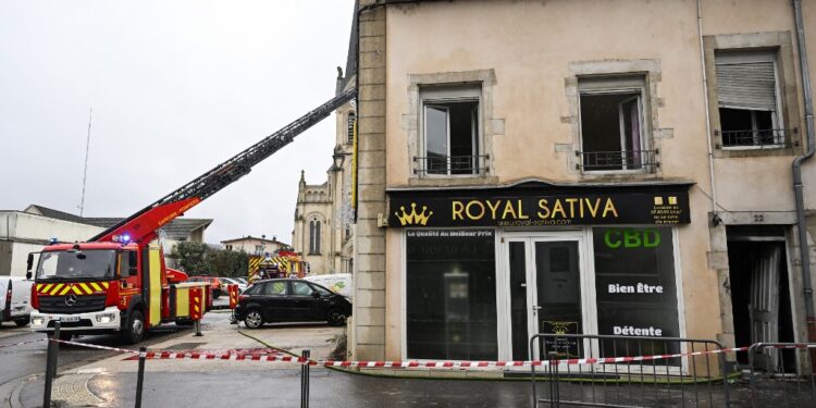Firefighters intervene on a site where at least five people died following a fire, in Neuves-Maisons, eastern France, on November 30, 2025. A 59-year-old man, a 60-year-old woman, a 20-year-old woman and a 16-year-old boy died, the fire brigade announced. A fifth person, who had been seriously injured, succumbed to their injuries, the prefecture said shortly afterwards. (Photo by Jean-Christophe VERHAEGEN / AFP)