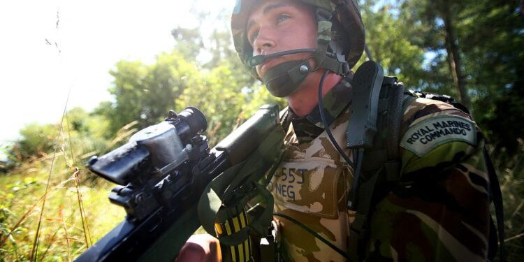 A soldier takes part in a mission rehearsal exercise by the 3 Commando Brigade (Royal Marines) on Salisbury Plains, Wiltshire, southern England, ahead of their August deployment to Afghanistan, on July 30, 2008. Up to 5,800 troops of the Brigade have taken part in the exercises before joining with units such as 2nd Battalion The Royal Gurka Rifles and 1st The Queen's Dragoon Guards in "Operation Herrick 9" in the Helmand Province. AFP PHOTO/Leon Neal (Photo by LEON NEAL / AFP)