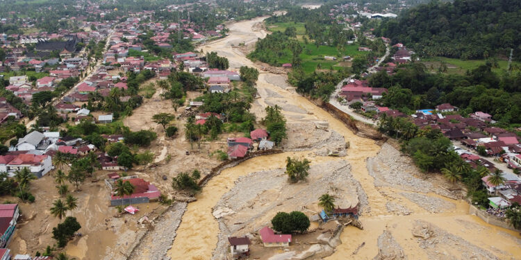 A drone view shows an area hit by deadly flash floods following heavy rains in Padang, West Sumatra province, Indonesia, November 30, 2025. REUTERS/Aidil Ichlas