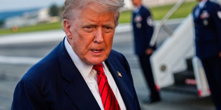 President Donald Trump speaks with reporters before boarding Air Force One at Lehigh Valley International Airport, Sunday, Aug. 3, 2025, in Allentown, Pa. (AP Photo/Julia Demaree Nikhinson)